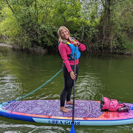 Girl_on_fun_colourful_design_paddleboard_ISUP